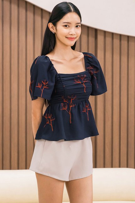 Dalsy Flutter Sleeve Ruched Peplum Top (Navy Spring Bloom)
