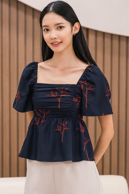 Dalsy Flutter Sleeve Ruched Peplum Top (Navy Spring Bloom)