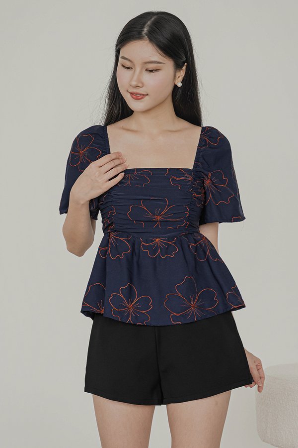 Dalsy Padded Flutter Sleeve Ruched Peplum Top (Navy Florette)